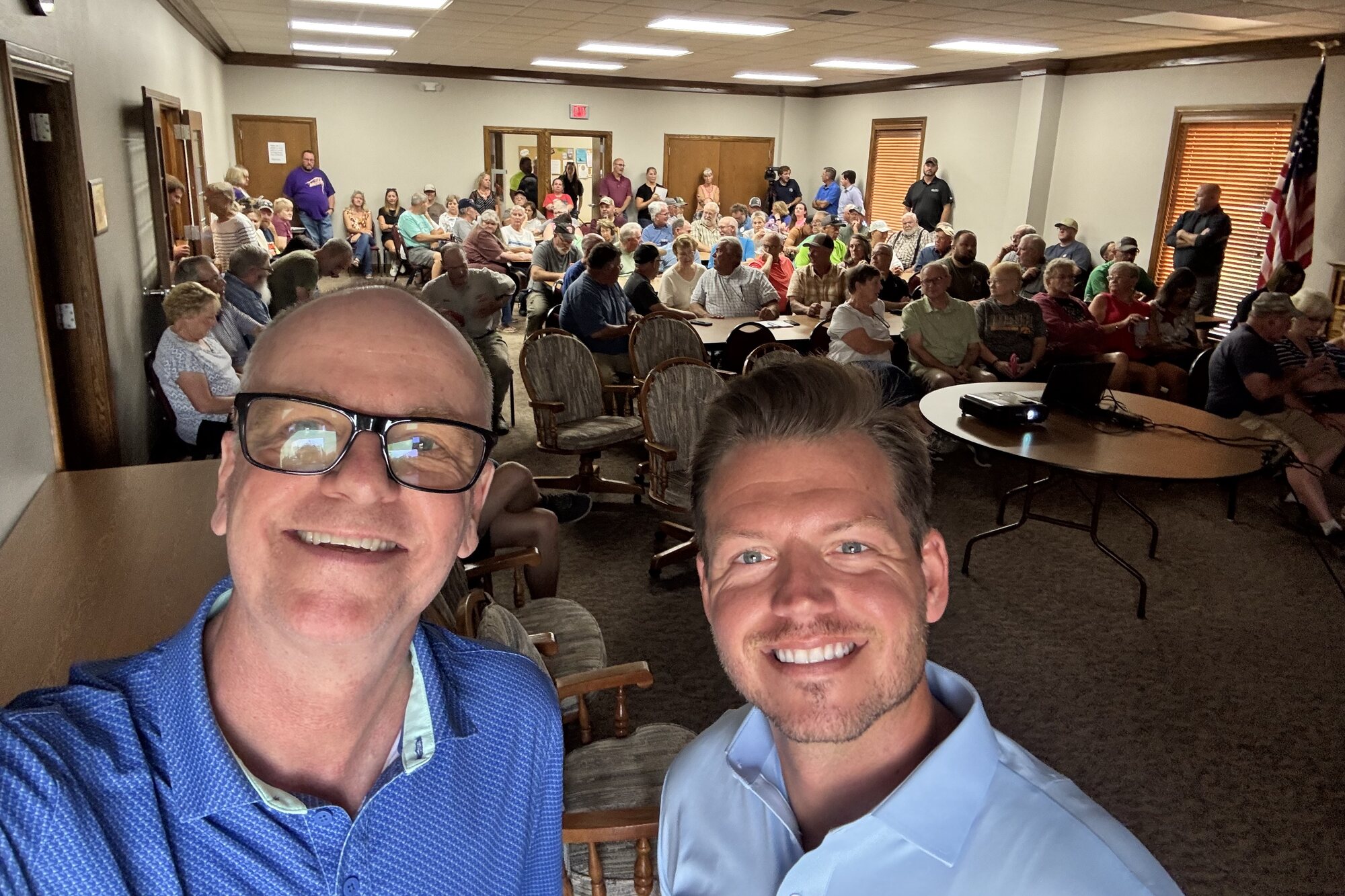 Kevin Donnelly and Gyles Uhlenhopp of PathOne in front of a full room at one of our community meetings
